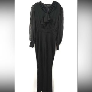 NWT bebe Black Sheer Peep Front Puff Sheer LS Flare Leg Jumpsuit Size 8